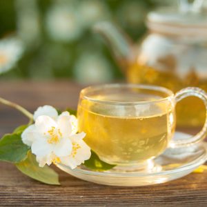 delicious green tea in a beautiful glass bowl on a table